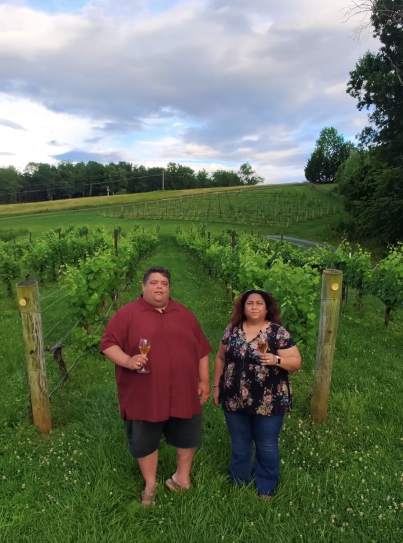 Chad and Crista in front of Petit Manseng
